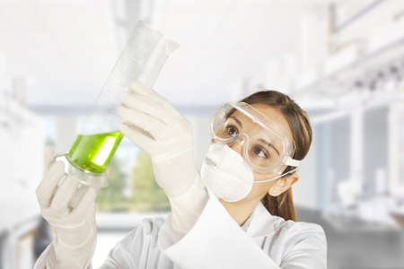 Portrait of a young chemist working with medicineの写真素材