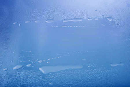 Blue abstract background with dropsの写真素材