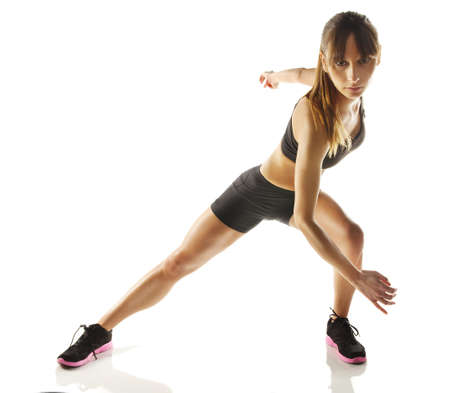Beautiful athlete woman doing fitness exerciseの写真素材