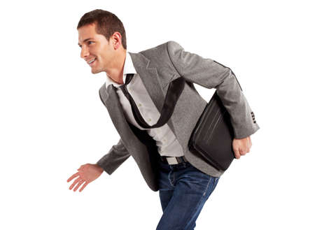 Happy businessman with briefcase