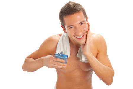 Portrait of a young handsome man with a skin for shavingの写真素材
