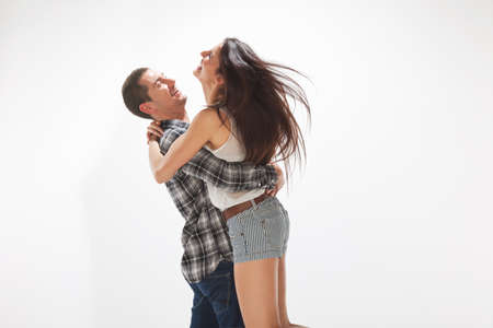 Portrait of happy couple on white backgroundの写真素材