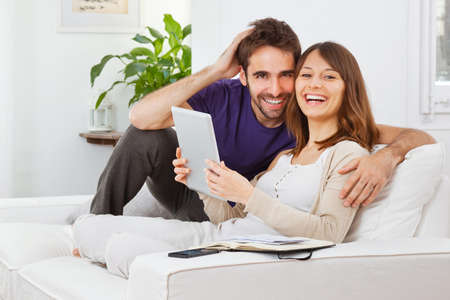 Happy young couple smilingの写真素材