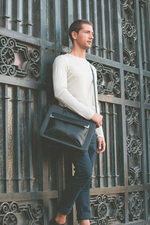 Young businessman with a briefcase の写真素材