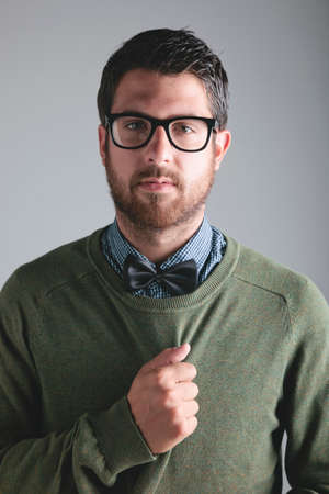 Young modern man portrait wearing bow tie の写真素材