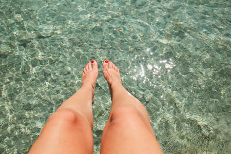 Beauty of red nails of young woman の写真素材