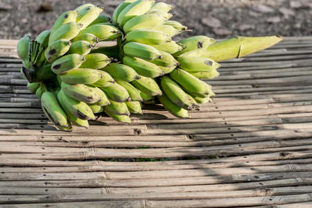 Unripe banana was cutted and wait to be eatenの写真素材