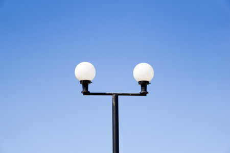 Street lamp in the blue skyの写真素材