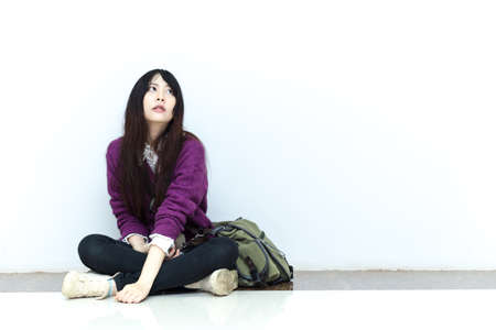 Asian girl in casual wear on white backgroundの写真素材