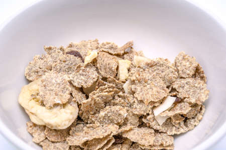 Fruit and grain flake on white background