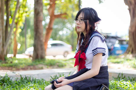 Asian school girl with charming eyesの写真素材