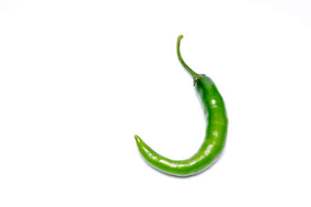 Green hot pepper on white backgroundの写真素材