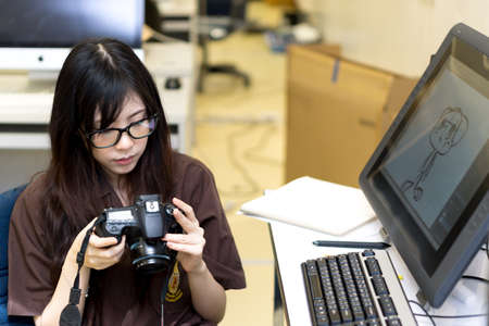Asian girl in engineering workshop  uniform