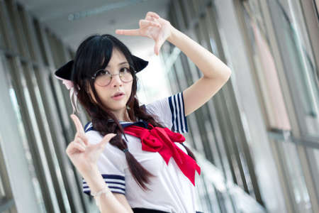 Asian school girl with charming eyesの写真素材