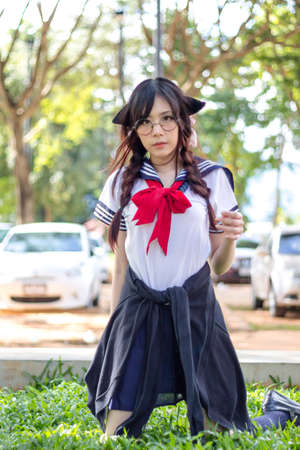 Asian school girl with charming eyesの写真素材