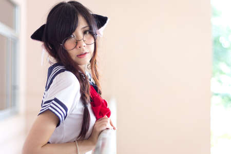 Asian school girl with charming eyesの写真素材