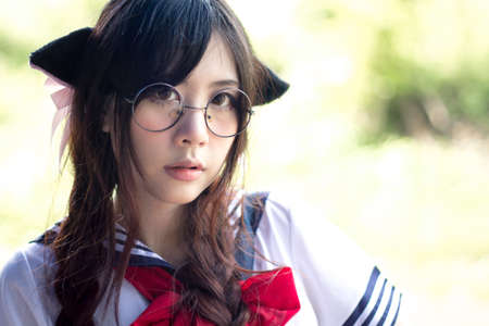 Asian school girl with charming eyesの写真素材