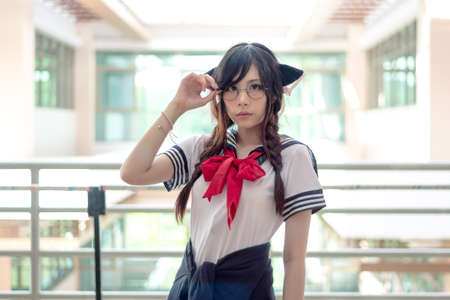Asian school girl with charming eyesの写真素材