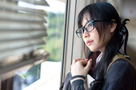 Asian girl in uniform studying in universityの写真素材