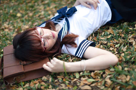 Asian school girl with charming eyesの写真素材