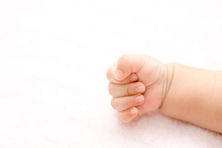 Close up of a small baby handの写真素材