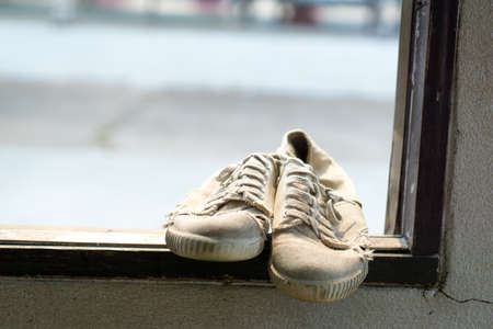 Old canvas Thai student shoesの写真素材