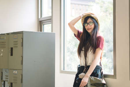 Portrait of charming Asian girl in film color style
