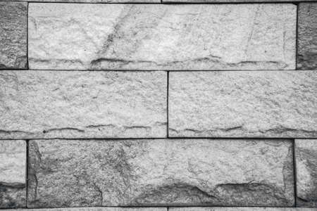 Red brick wall with glossy surfaceの写真素材