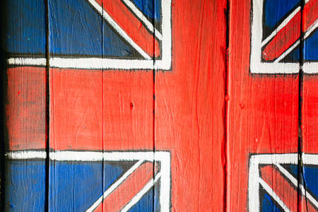 United kingdom flag painted on wooden windowの写真素材