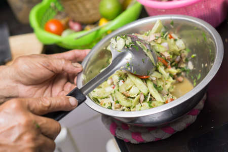 Cooking Thai spicy cucumber saladの写真素材