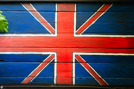 United kingdom flag painted on wooden windowの写真素材