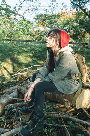 Charming Asian girl in the parkの写真素材