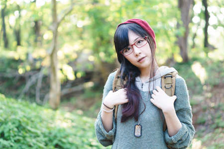 Charming Asian girl in the park