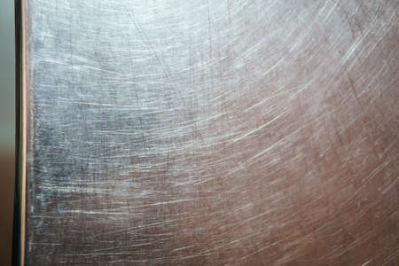 Old scratched metal texture backgroundの写真素材