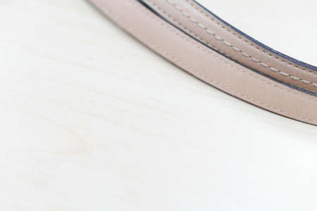 Leather strap on woman bagの写真素材