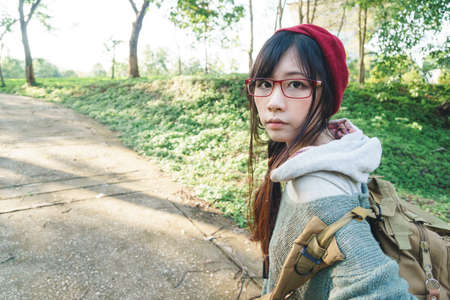 Charming Asian girl in the park