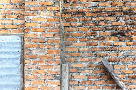 Old red brick wall backgroundの写真素材