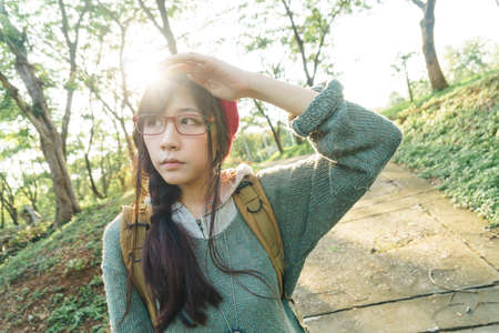 Charming Asian girl in the park