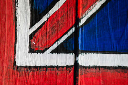 United kingdom flag painted on wooden windowの写真素材