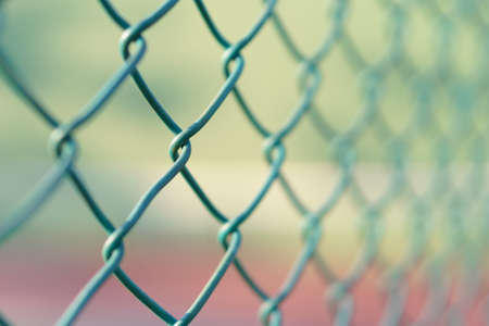 Green wire mesh steel at tennis court