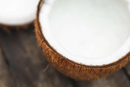 coconut with shell on wooden background