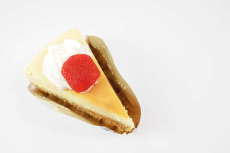 Slice of Plain New York Cheesecake in a boxの写真素材