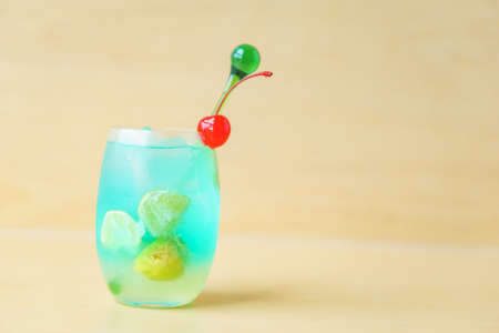Home made cocktail on wooden background