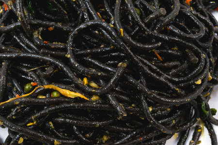 Instant stir fried spicy black spaghetti from supermarketの写真素材