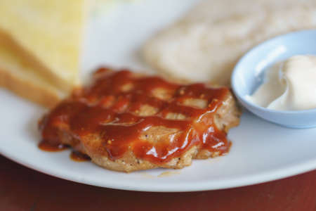 Dish of chicken spaghetti with pork steakの写真素材