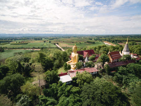 Aerial shot of big Buddha Statue at Thai public temple
