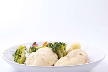 Boiled chicken breast with vegetablesの写真素材