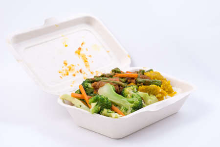 Thai food in plant fiber food box isolated on white backgroundの写真素材