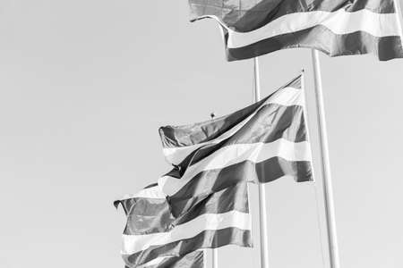 Thai flag was lowered to half-mast for paying respect for the king of Thailandの写真素材