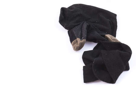 Old unpair socks isolate on white backgroundの写真素材